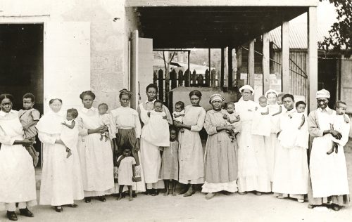 Photograph from Deaconess orphanage, Frederiksted, St. Croix. Group photo including Sister Maren, Miss James, Marchal and Sister Nic. Maritime Museum of Denmark.
